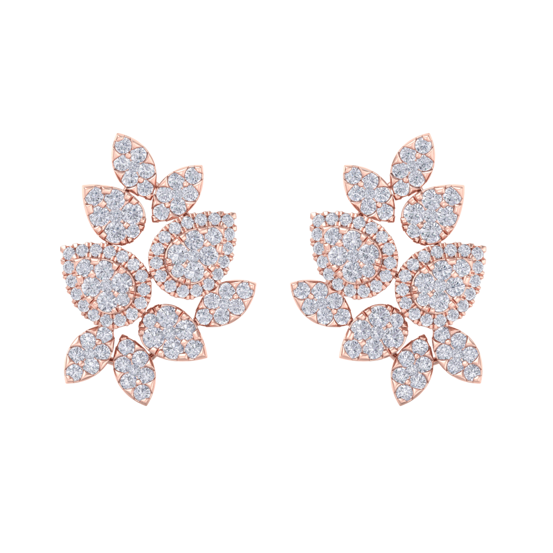 Flower shaped stud earrings in yellow gold with white diamonds of 3.11 ct in weight