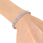 Load image into Gallery viewer, Baguette tennis bracelet in yellow gold with white diamonds of 5.20 ct in weight
