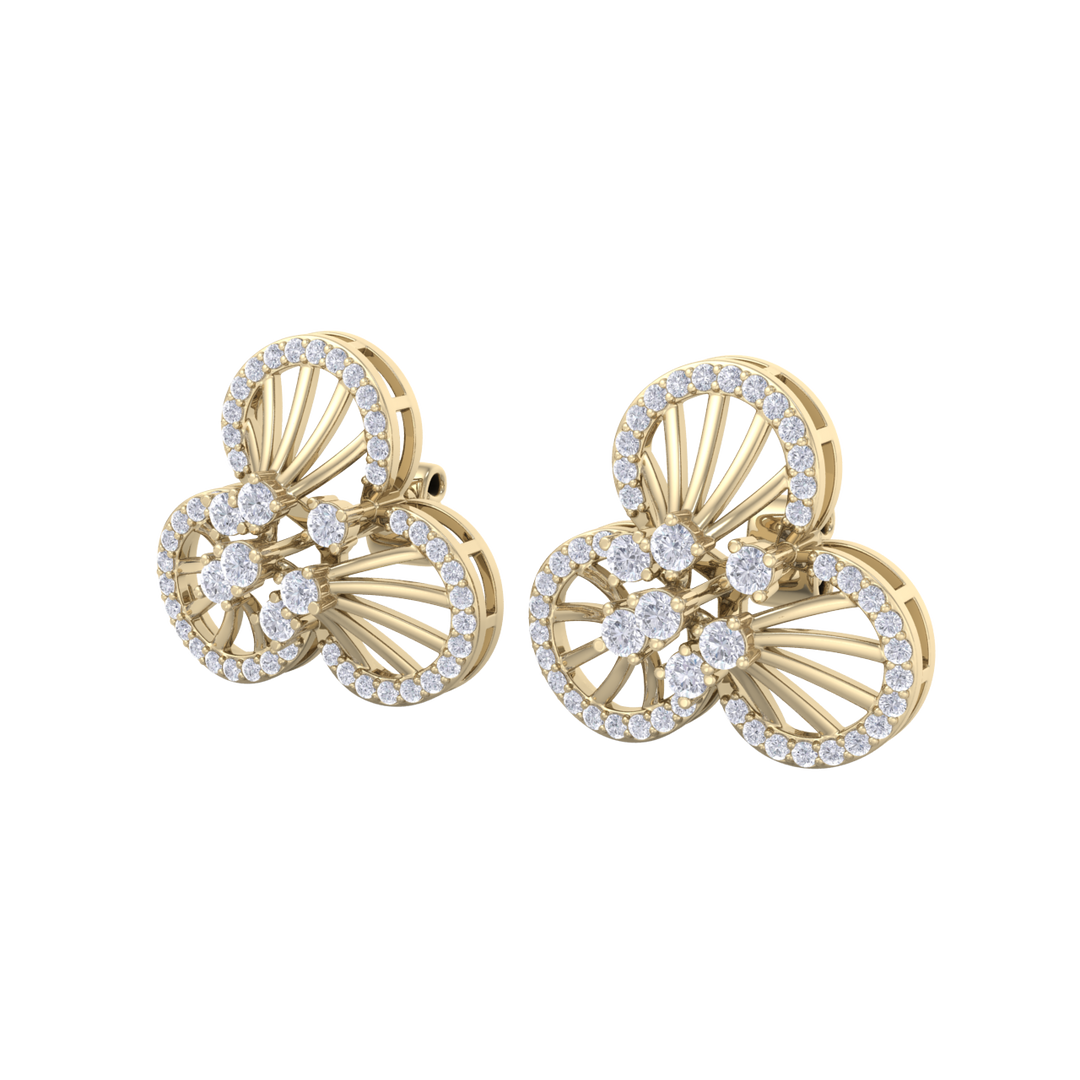 Flower shaped stud earrings in yellow gold with white diamonds of 0.84 ct in weight